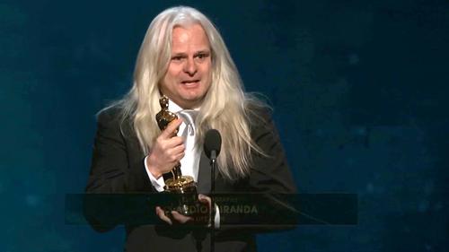 Claudio Miranda, with his Oscar for Best Achievement in Cinematography for Life of Pi (2012), at the